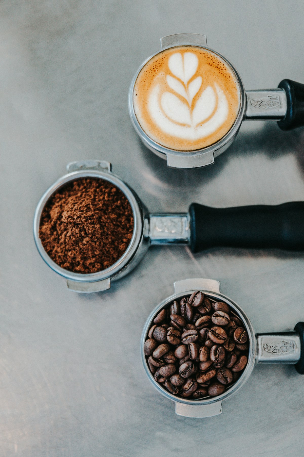 Barista adjusting espresso grind during dial-in